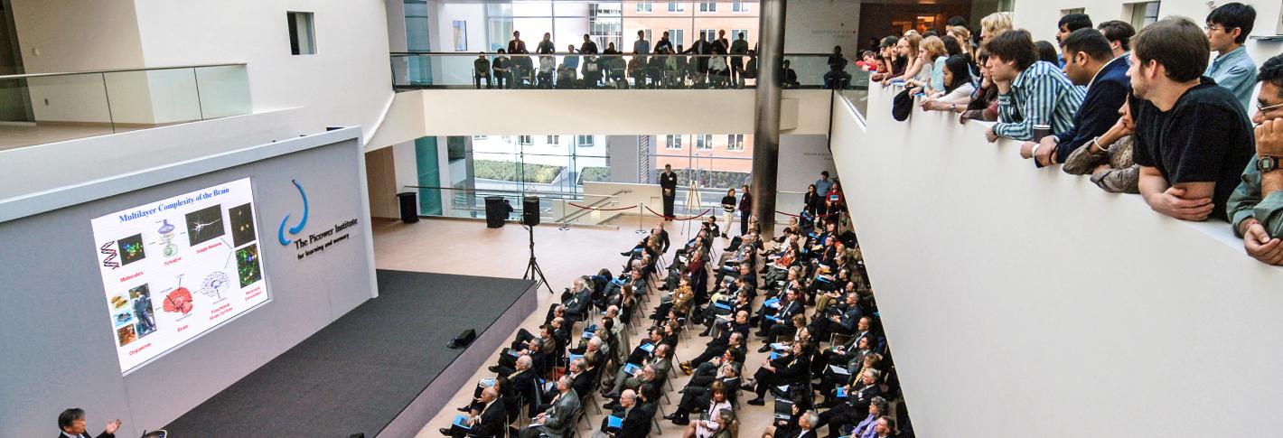 A crowded lecture presentation