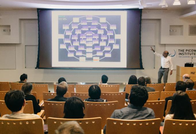 Emery Brown presents a slide at the Fall 2018 symposium